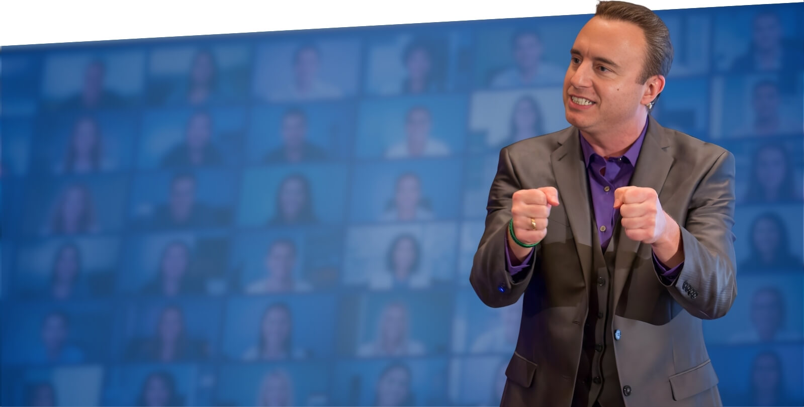 Keynote Speaker Noah St. John presenting on stage at a corporate leadership conference
